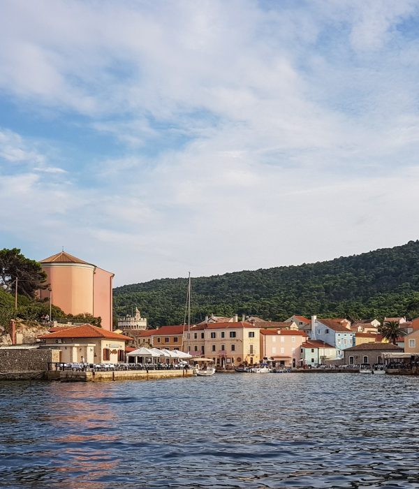 Townscape of idyllic seaside town at sunset. in Veli Lošinj in Croatia.