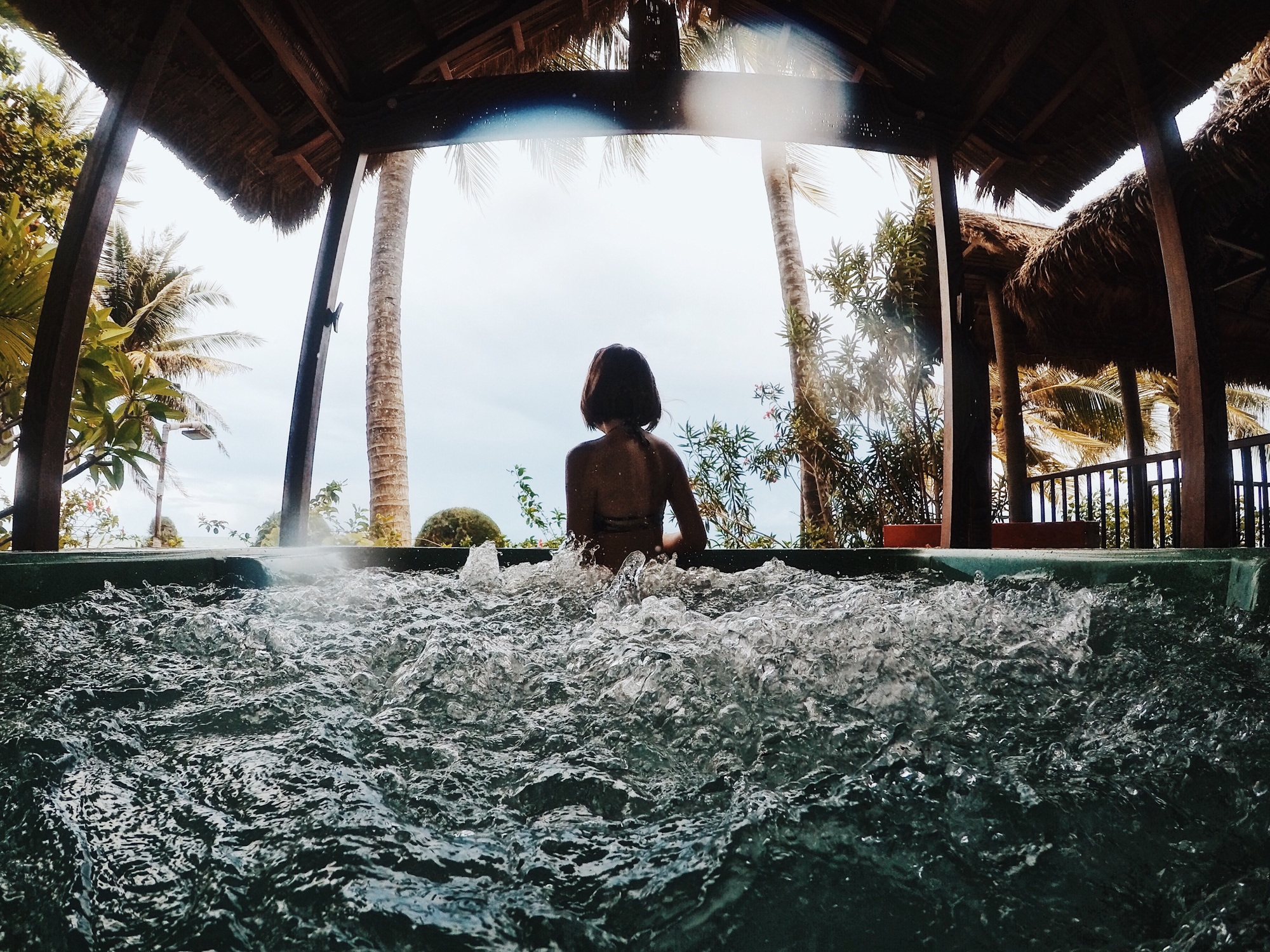 Woman in jacuzzi.